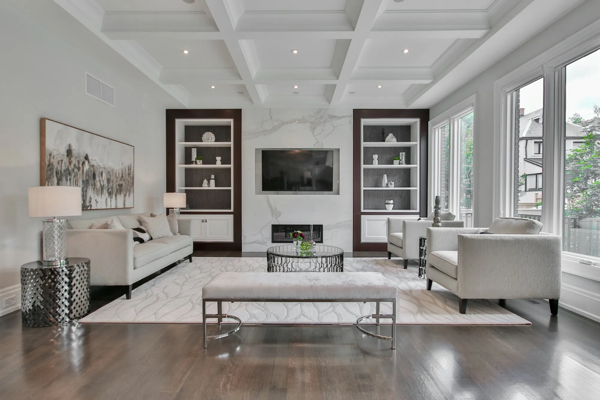 Finished basement family room with recessed lights and a sectional sofa